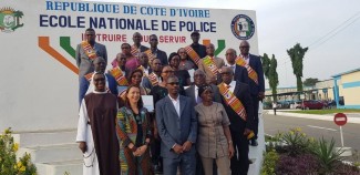 Group photo of the 18 treatment professionals that successfully passed the UTC ICAP 1 accreditation examination, with the Representatives of the Director of Cabinet of the Minister of Security and Civil Protection and the President of the University Félix Houphouet Boigny d'Abidjan, Cocody, Republic of Côte d’Ivoire